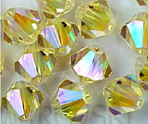 Toupies Swarovski 4mm JONQUIL AB2X XILION / 25 perles