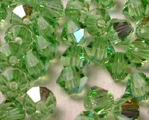 Toupies Swarovski 4mm PERIDOT AB / 20 perles