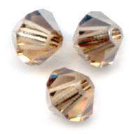 Toupies Swarovski 4mm LIGHT COLORADO TOPAZ SATIN / 20 perles 