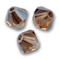 Toupies Swarovski 4mm LIGHT SMOKED TOPAZ SATIN / 20 perles Prix dégressif